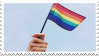 Pride flag held in hand